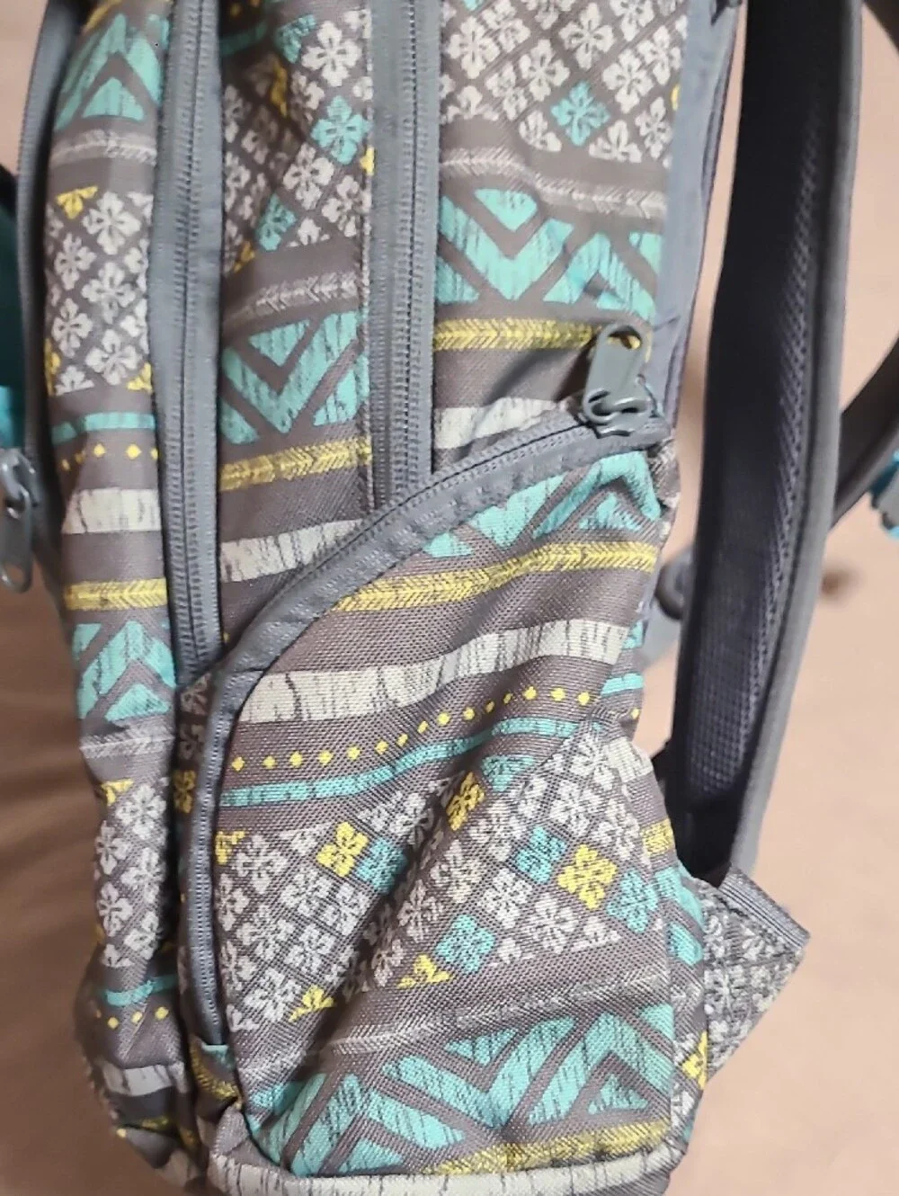 Gray Patterned Backpack with Aqua & Yellow Accents